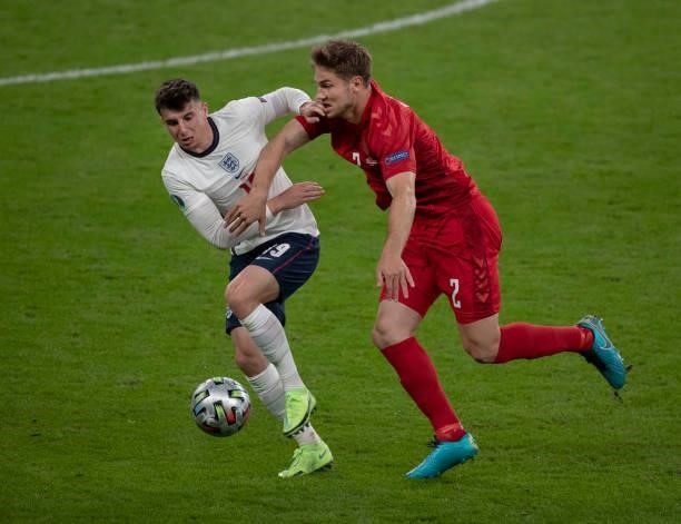 Mason Mount of England and Joachim Andersen of Denmark in action during the UEFA Euro 2020 Championship Semi-final match between England and Denmark...