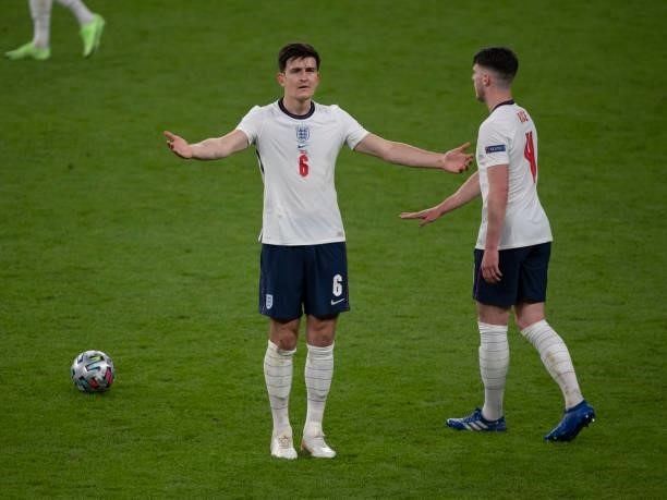 Harry Maguire of England complains about a refereeing decision during the UEFA Euro 2020 Championship Semi-final match between England and Denmark at...
