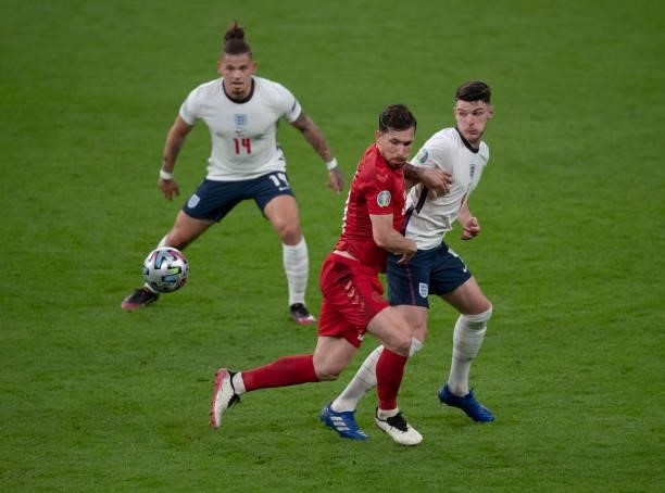 Declan Rice and Kalvin Phillips of England in action with Pierre-Emile Højbjerg of Denmark during the UEFA Euro 2020 Championship Semi-final match...
