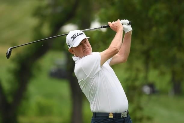 Roger Chapman of England plays his shot from the fourth tee during the first round of the U.S. Senior Open Championship at the Omaha Country Club on...