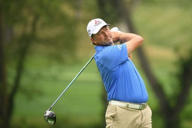 Retief Goosen of South Aftrica plays his shot from the fourth tee during the first round of the U.S. Senior Open Championship at the Omaha Country...