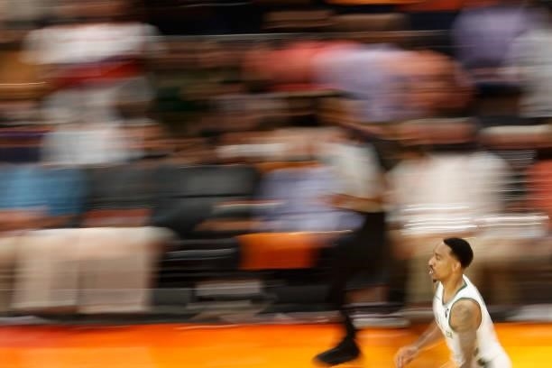 Jeff Teague of the Milwaukee Bucks moves the ball up-court in game two of the NBA Finals at Phoenix Suns Arena on July 08, 2021 in Phoenix, Arizona....