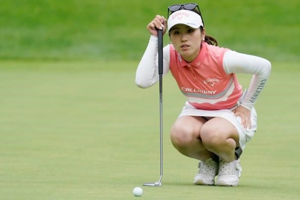 Yuna Nishimura of Japan lines up her putt on the 18th hole during the second round of the Nipponham Ladies Classic at Katsura Golf Club on July 09,...