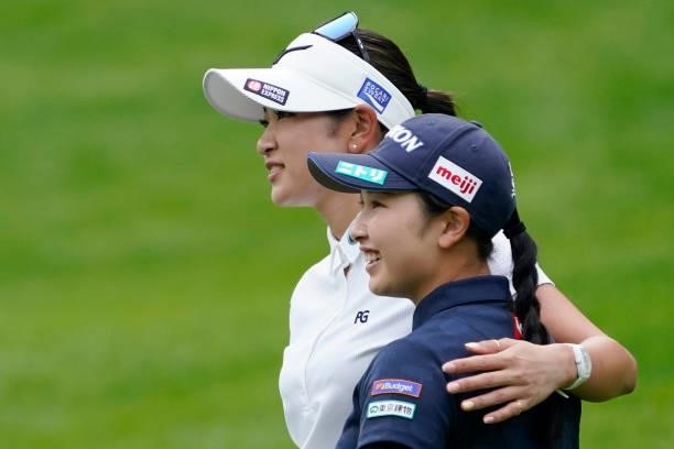 Sakura Koiwai of Japan and Erika Hara of Japan hug after finishing their round during the second round of the Nipponham Ladies Classic at Katsura...