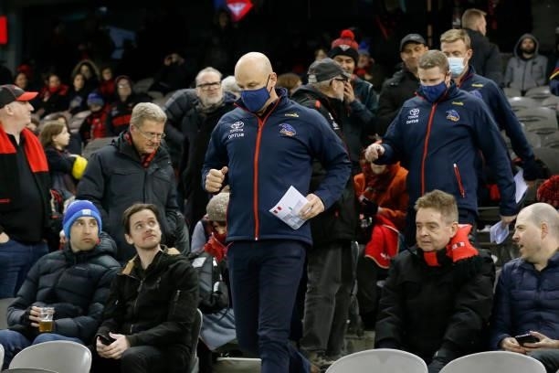 Adelaide Crows senior coach Matthew Nicks walks down to the 3/4 time huddle during the round 17 AFL match between Essendon Bombers and Adelaide Crows...