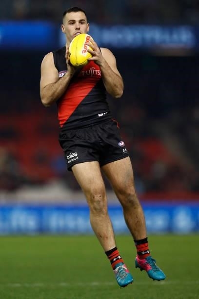 Alec Waterman of the Bombers marks the ball during the round 17 AFL match between Essendon Bombers and Adelaide Crows at Marvel Stadium on July 09,...