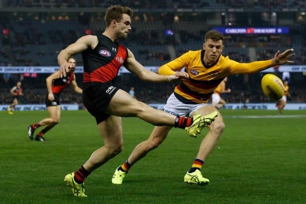 Will Snelling of the Bombers kicks the ball during the round 17 AFL match between Essendon Bombers and Adelaide Crows at Marvel Stadium on July 09,...