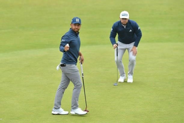 Xander Schauffele of the United States reacts on the 18th green during Day Two of the abrdn Scottish Open at The Renaissance Club on July 09, 2021 in...