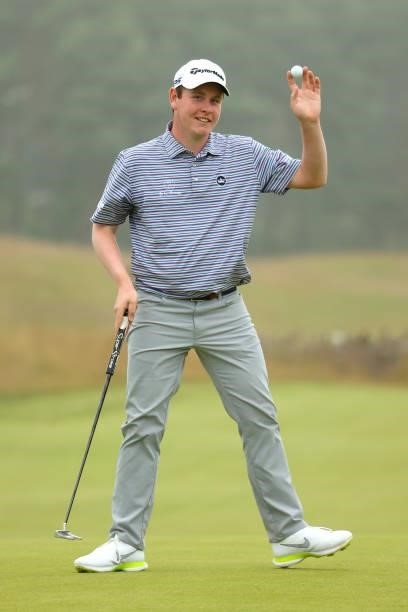 Robert MacIntyre of Scotland acknowledges the crowd on the 18th green during Day Two of the abrdn Scottish Open at The Renaissance Club on July 09,...