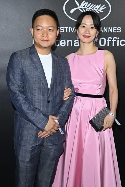 Meng Li and guest attend the photocall ahead of the Chopard Trophy dinner during the 74th annual Cannes Film Festival on July 09, 2021 in Cannes,...