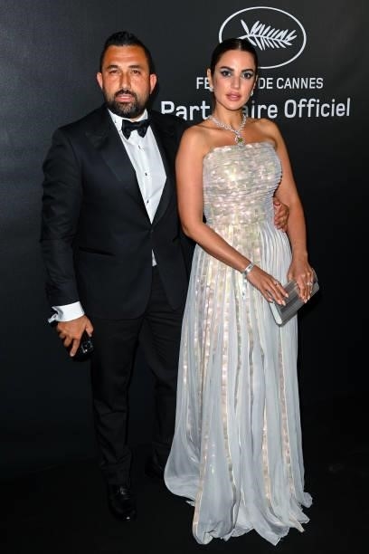 Hany Saad and Dorra Zarrouk attend the photocall ahead of the Chopard Trophy dinner during the 74th annual Cannes Film Festival on July 09, 2021 in...