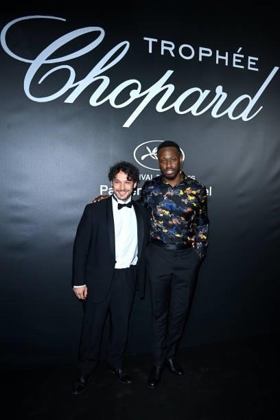 Dadju and a guest attend the photocall ahead of the Chopard Trophy dinner during the 74th annual Cannes Film Festival on July 09, 2021 in Cannes,...