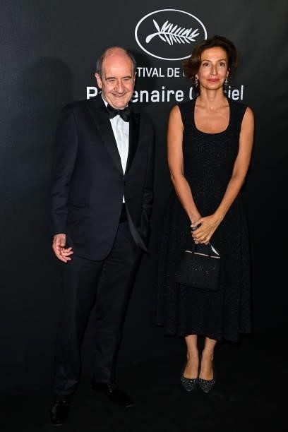 President of the Festival Pierre Lescure and Frederique Lescure attend the photocall ahead of the Chopard Trophy dinner during the 74th annual Cannes...