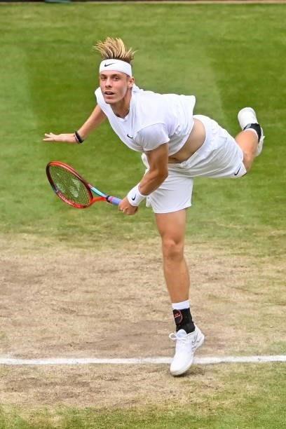 Dennis Shapovalov of Canada serves against Novak Djokovic of Serbia in the semi-finals of the gentlemen's singles during Day Eleven of The...