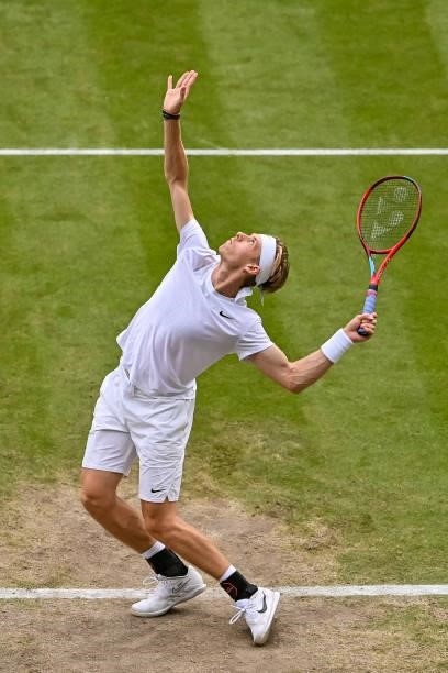 Dennis Shapovalov of Canada serves against Novak Djokovic of Serbia in the semi-finals of the gentlemen's singles during Day Eleven of The...