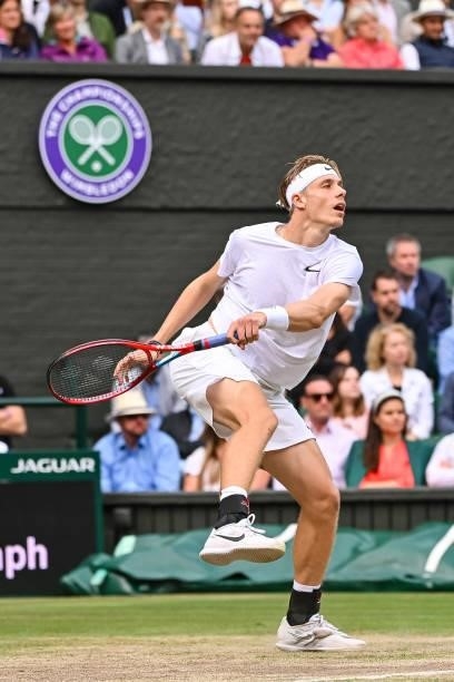 Dennis Shapovalov of Canada hits a forehand against Novak Djokovic of Serbia in the semi-finals of the gentlemen's singles during Day Eleven of The...