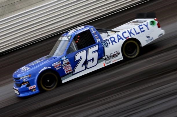 Josh Berry, driver of the Rackley Roofing Chevrolet, drives during qualifying for the NASCAR Camping World Truck Series Corn Belt 150 presented by...