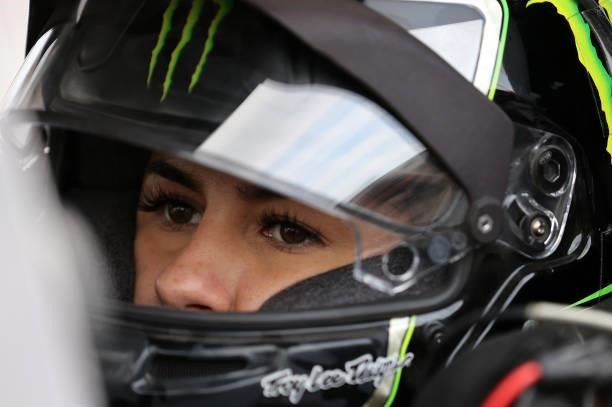 Hailie Deegan, driver of the Toter/Engine Ice Ford, sits in her truck for qualifying for the NASCAR Camping World Truck Series Corn Belt 150...