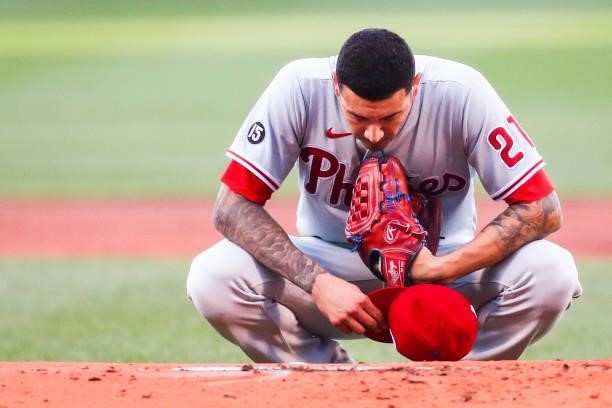 Vince Velasquez of the Philadelphia Phillies takes a moment to himself in the first inning of a game against the Boston Red Sox at Fenway Park on...