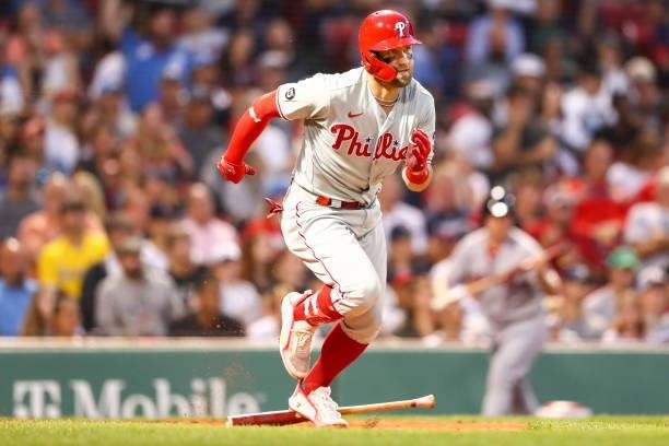 Bryce Harper of the Philadelphia Phillies runs to first base during a game against the Boston Red Sox at Fenway Park on July 9, 2021 in Boston,...