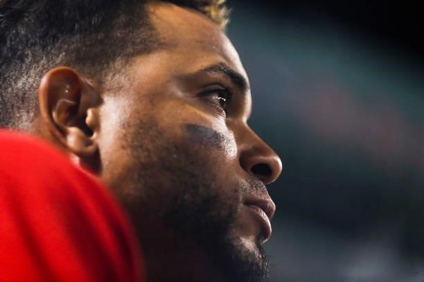 Xander Bogaerts of the Boston Red Sox looks on from the dugout during a game against the Philadelphia Phillies at Fenway Park on July 9, 2021 in...
