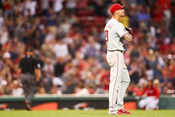 Vince Velasquez of the Philadelphia Phillies reacts after giving up a solo home run to Rafael Devers of the Boston Red Sox in the third inning of a...