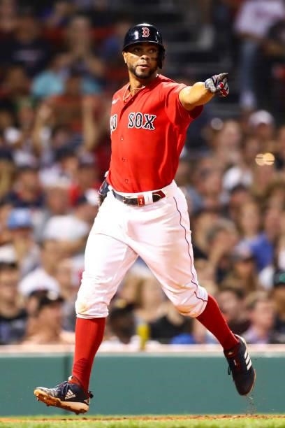 Xander Bogaerts of the Boston Red Sox scores in the sixth inning of a game against the Philadelphia Phillies at Fenway Park on July 9, 2021 in...