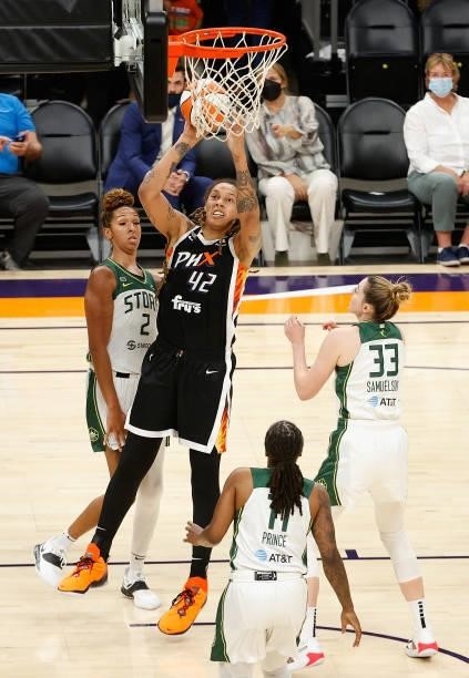 Brittney Griner of the Phoenix Mercury puts up a shot over Mercedes Russell, Epiphanny Prince and Katie Lou Samuelson during the first half of the...