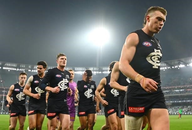 Patrick Cripps of the Blues leads his team off the field during the round 17 AFL match between Carlton Blues and Geelong Cats at Melbourne Cricket...
