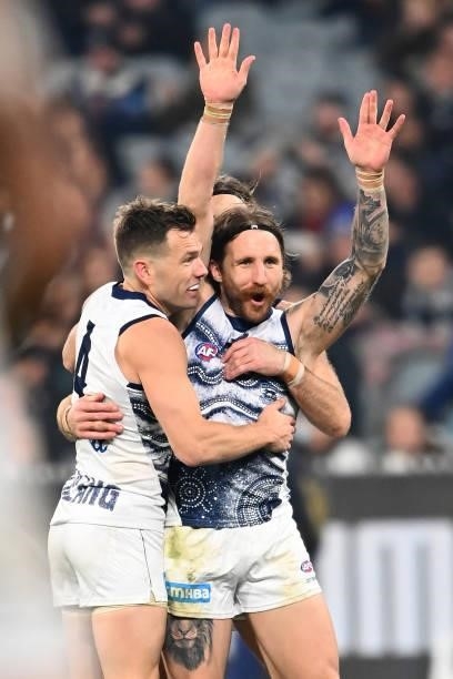 Zach Tuohy of the Cats is congratulated by team mates after kicking a goal during the round 17 AFL match between Carlton Blues and Geelong Cats at...