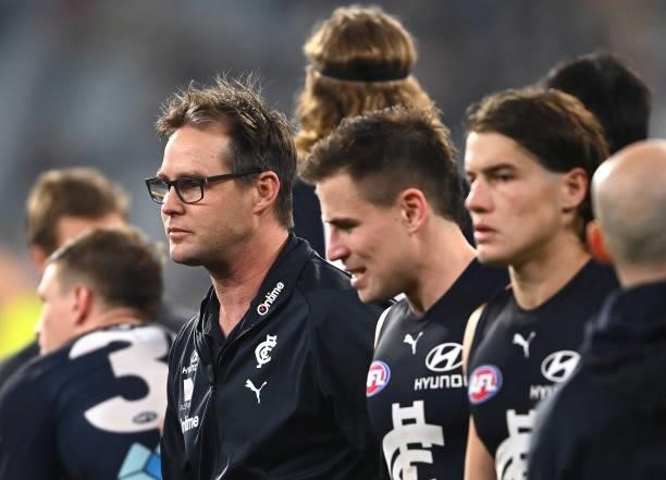 Blues head coach David Teague walks off after talking to his players during the round 17 AFL match between Carlton Blues and Geelong Cats at...