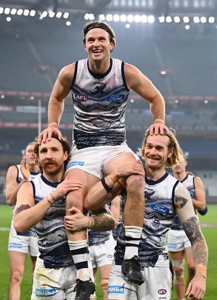 Lachie Henderson of the Cats is chaired off in his 200th game during the round 17 AFL match between Carlton Blues and Geelong Cats at Melbourne...
