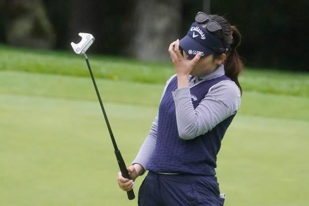 Yuna Nishimura of Japan reacts after missing her outt on the 18th hole during the third round of the Nipponham Ladies Classic at Katsura Golf Club on...