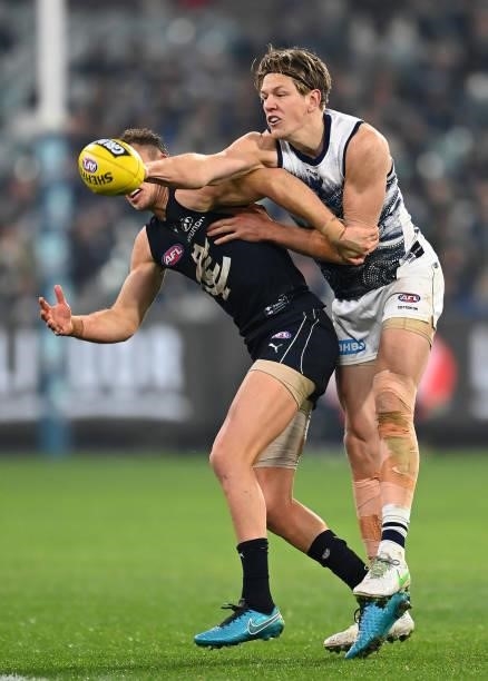 Rhys Stanley of the Cats spoils a mark by Patrick Cripps of the Blues during the round 17 AFL match between Carlton Blues and Geelong Cats at...