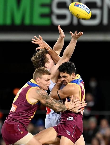 Charlie Cameron of the Lions collides with Ryan Byrnes of the Saints as they compete for the ball during the round 17 AFL match between Brisbane...