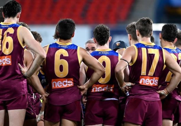 Coach Chris Fagan of the Lions talks to his players at the 3rd quarter time break during the round 17 AFL match between Brisbane Lions and St Kilda...