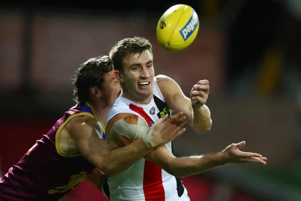Douglas Howard of the Saints handballs during the round 17 AFL match between Brisbane Lions and St Kilda Saints at The Gabba on July 10, 2021 in...
