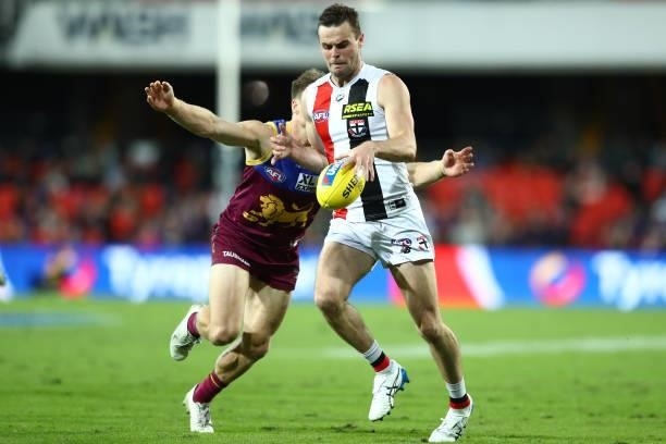 Brad Crouch of the Saints kicks during the round 17 AFL match between Brisbane Lions and St Kilda Saints at The Gabba on July 10, 2021 in Brisbane,...