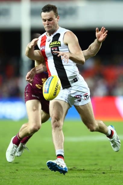 Brad Crouch of the Saints kicks during the round 17 AFL match between Brisbane Lions and St Kilda Saints at The Gabba on July 10, 2021 in Brisbane,...