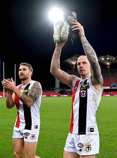Zak Jones and Dean Kent of the Saints celebrate victory after the round 17 AFL match between Brisbane Lions and St Kilda Saints at The Gabba on July...