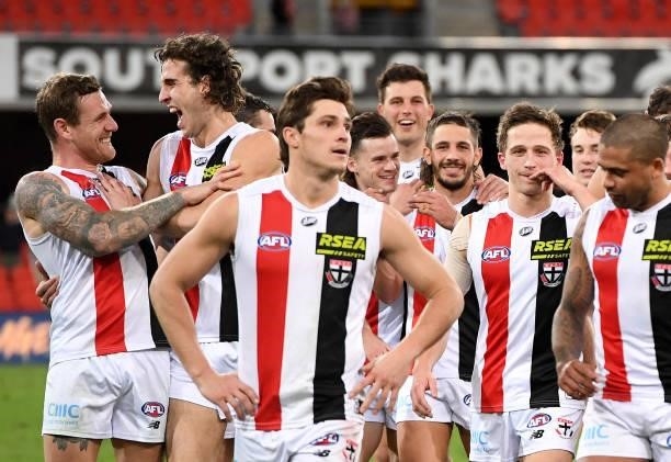 The Saints players celebrate victory after the round 17 AFL match between Brisbane Lions and St Kilda Saints at The Gabba on July 10, 2021 in...