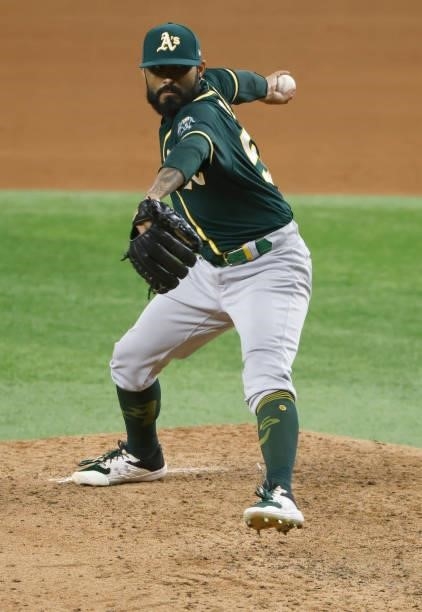 Sergio Romo of the Oakland Athletics pitches against the Texas Rangers during the sixth inning at Globe Life Field on July 9, 2021 in Arlington,...