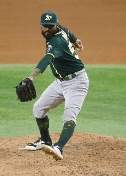 Sergio Romo of the Oakland Athletics pitches against the Texas Rangers during the sixth inning at Globe Life Field on July 9, 2021 in Arlington,...