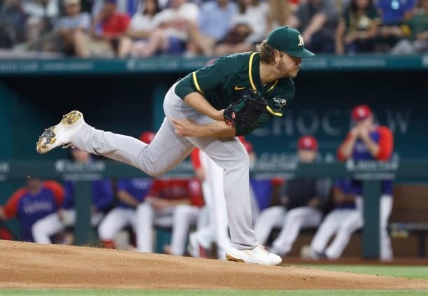 Cole Irvin of the Oakland Athletics delivers against the Texas Rangers during the first inning at Globe Life Field on July 9, 2021 in Arlington,...