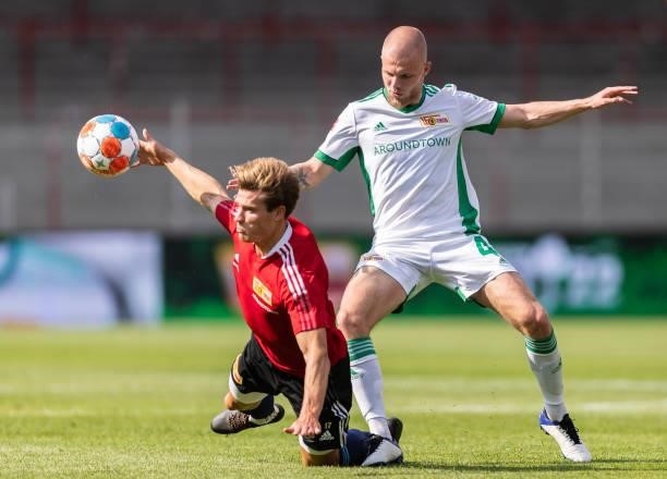 Kevin Behrens of 1.FC Union Berlin is challenged by Rick van Drongelen of 1.FC Union Berlin during the pre-season friendly match between 1.FC Union...
