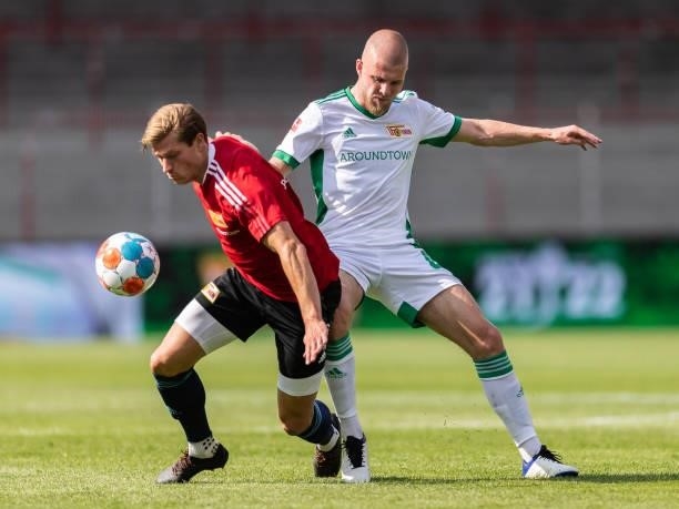 Kevin Behrens of 1.FC Union Berlin is challenged by Rick van Drongelen of 1.FC Union Berlin during the pre-season friendly match between 1.FC Union...