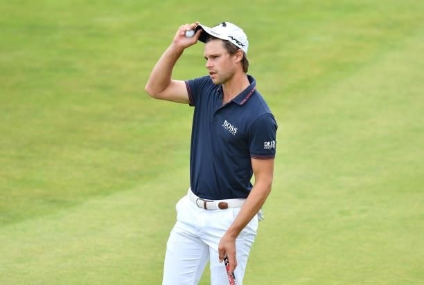 Thomas Detry of Belgium acknowledges the crowd on the 18th green during Day Three of the abrdn Scottish Open at The Renaissance Club on July 10, 2021...