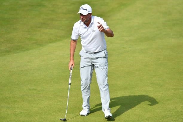 Richard Bland of England acknowledges the crowd on the 18th green during Day Three of the abrdn Scottish Open at The Renaissance Club on July 10,...