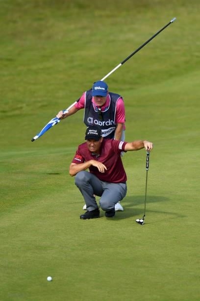 Padraig Harrington of Ireland lines up a putt on the 18th green during Day Three of the abrdn Scottish Open at The Renaissance Club on July 10, 2021...