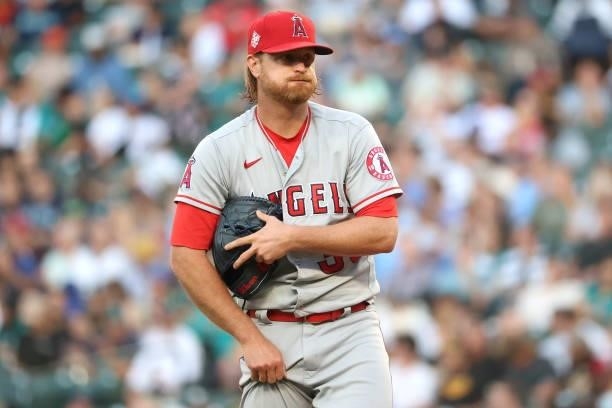 Alex Cobb of the Los Angeles Angels reacts during the third inning against the Seattle Mariners at T-Mobile Park on July 09, 2021 in Seattle,...